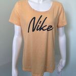 Nike  Women’s Dri-FIT Script-Logo Orange Scoop Neck Training T-Shirt Medium Photo 0