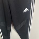 Adidas  Black Sweatpants with Signature Stripes Photo 1