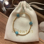 ENewton  Cross Bracelet Photo 0