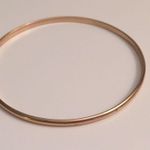 5 FOR $25 Set of 4 gold arrow bangles. Photo 2