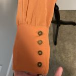 Double Zero | Light caramel V-neck long split sleeve blouse.  Longer, sheer back. Photo 5