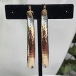 Gold Swirl Diamond Cut Tube Hoop Earrings Photo 3