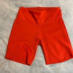 New Balance bright orange biker shorts Photo 0