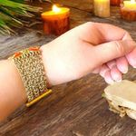 Kenneth Cole Gold-Tone Stretch Bracelet w/ Red & Amber Stones Photo 3