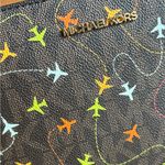 Michael Kors Authentic  leather/canvas airplane prints Crossbody Bag Photo 4