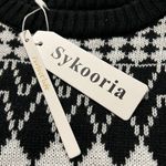 Sykooria x Photo 2