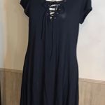 Polly & Esther Boutique purchase from Nashville, TN. Lace up front. Flows, high low hem. Photo 0