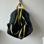 Leather Trim Embellishment & Dual Exterior Pockets Photo 2