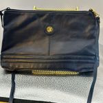 Crossbody dark blue with a Z emblem on the front but no markings on the bag.​​​ Photo 0