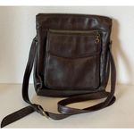 Valerie Stevens  leather crossbody bag in brown. Photo 0