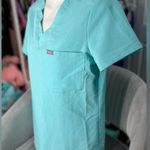 FIGS Teal Scrub Top Photo 2