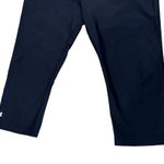 Under Armour Women’s black fitted heat gear athletic capri pants size large Photo 2