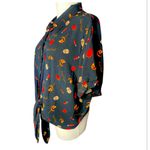 Trick R Treat Sam
Crop Shirt Spirit Halloween NWOT
Black Button Photo 3