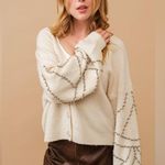 518. Gunmetal Pearl Puff Dolman Sleeve Cardigan in Cream Size undefined Photo 1