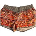 Athleta  workout shorts black and Orange cute running shorts women’s 14 Photo 0