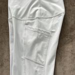 90degree by Reflex biker shorts with side pockets. Size XS. Color light gray. Gray Photo 3