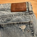 Hidden Button Up Light Wash Cut Off Jean Shorts Blue Size L Photo 2