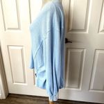 Urban Outfitters  blue V-neck cozy top Photo 1