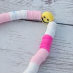 Pink & White Stretch Bracelet with a Smiley Face Photo 2