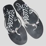 Guess  black foam sandals! Euc! Cute silver sparkle charm on front! Photo 0