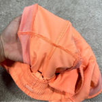 Athleta  Mesh Racer Run Mid Rise 4” Shorts Pull On Running in Orange Size XXS Photo 7