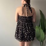 American Eagle  Floral Halter Neck Romper Black and Cream Scoop V-Neck Tie Bow Photo 1
