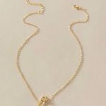 UB Planet Necklace Gold Photo 1