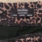 Berksha  Leopard Flare Pants Photo 1