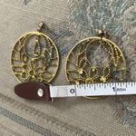 Open work hanging earrings Photo 1