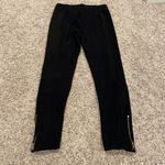 Active USA Active size small black pull on stretchy skinny pants with zipper detail Photo 1