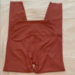 Nike High-Waisted Salmon-Colored Leggings Photo 3