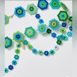 Free People Anna Sui X Daisy Chains Beaded Floral Chain Belt. Photo 1