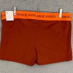 Nike NEW  Pro Dri Fit Mid-Rise Shorts Women XXL Orange 3in GRX Athletic Training Photo 3