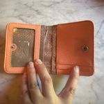 Relic pink peachy wallet paper money and coins Photo 3