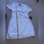 Lulus  dress small NWT made with love Low Round neck Open Back waistline White Photo 7