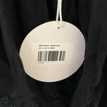 Princess Polly NWT  Black Short Sleeve Shirred Open Back Romper Photo 7