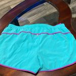 New Balance Women's Turquoise and Purple Shorts Photo 2