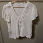 Eyeshadow Cream V-Neck Buttoned Blouse Photo 0