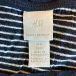 H&M ⭐️  black striped shirt in size medium Photo 2