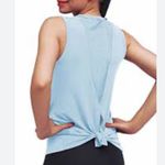 Mippo Womens Size M Mesh Split Back Crew
Neck Athletic Tank Top Powder Blue NEW Size M Photo 2