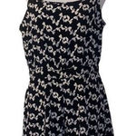 Maude  bow pattern‎ open back romper Photo 0