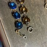 Pair of Blue and Brown Gemstone Bracelets Photo 3