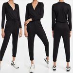 Beyond Yoga  Cozy Fleece Jogger Black Jumpsuit with Criss Cross Opening L… Photo 1