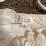 Kirious White  Top Photo 1
