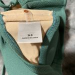 Shade & Shore  Green Twist Front Halter Top Photo 4