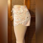 Athleta  shorts size
M Peach and White Patterned Shorts Photo 1