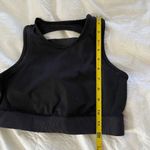 Champion Never worn: black  sports bra Photo 2