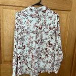 Maurice's Maurice’s long sleeved, floral, V neck blouse Photo 1