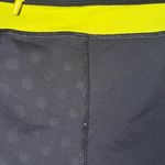 Lululemon Black and Yellow Athletic Leggings Photo 2