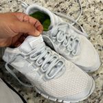 Nike Grey and White Athletic Sneakers Photo 3
